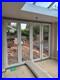 Conservatory-set-up-Bi-fold-doors-windows-Lantern-roof-light-Sky-light-01-ulc