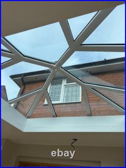 Conservatory set up Bi fold doors, windows, Lantern roof light (Sky light)