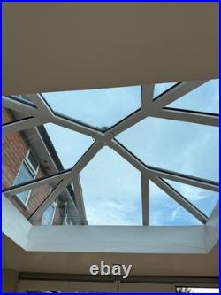 Conservatory set up Bi fold doors, windows, Lantern roof light (Sky light)