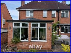 Conservatory set up Bi fold doors, windows, Lantern roof light (Sky light)
