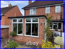 Conservatory set up Bi fold doors, windows, Lantern roof light (Sky light)